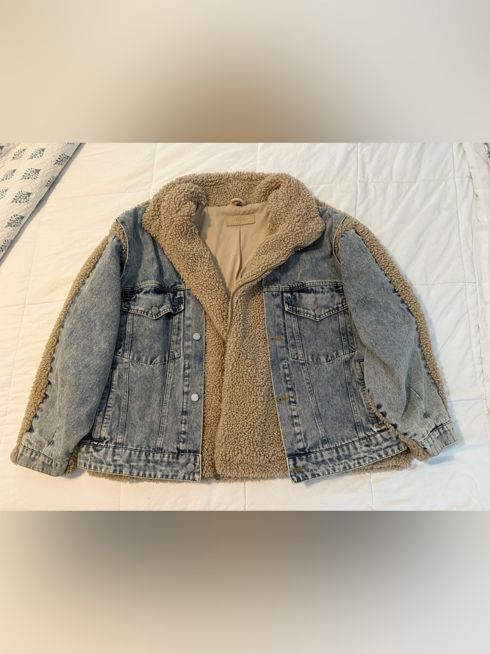 Blank NYC Light Wash Denim Jacket with Beige Sherpa Lining